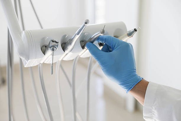 Professional Tooth Extraction technician working in Troy, TX